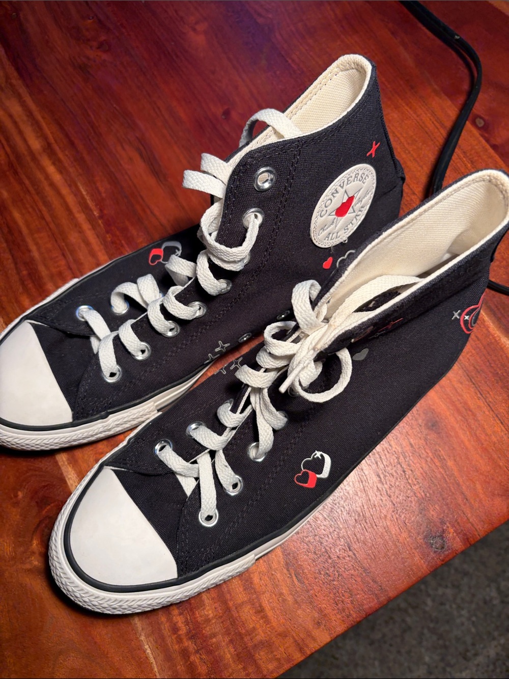 Converse Black High-Top Canvas Sneakers with Red Heart Details